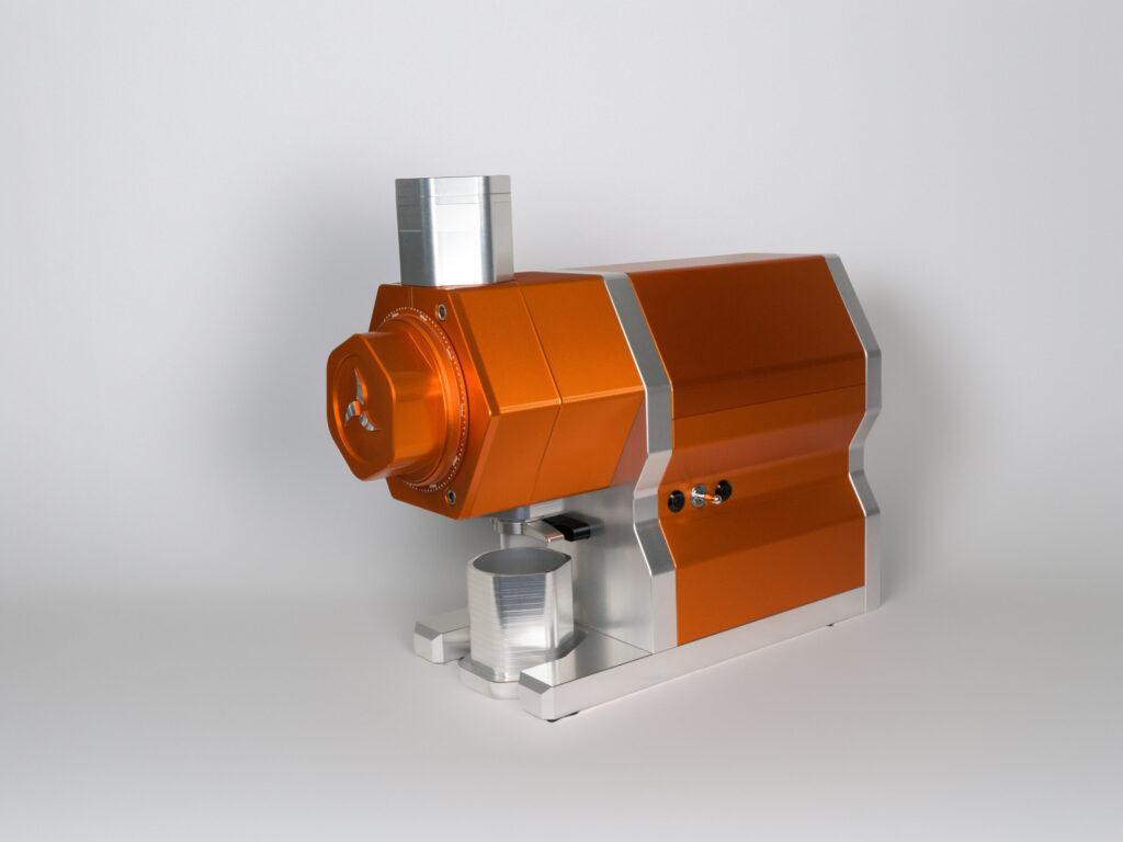 M98V grinder in orange with silver accents